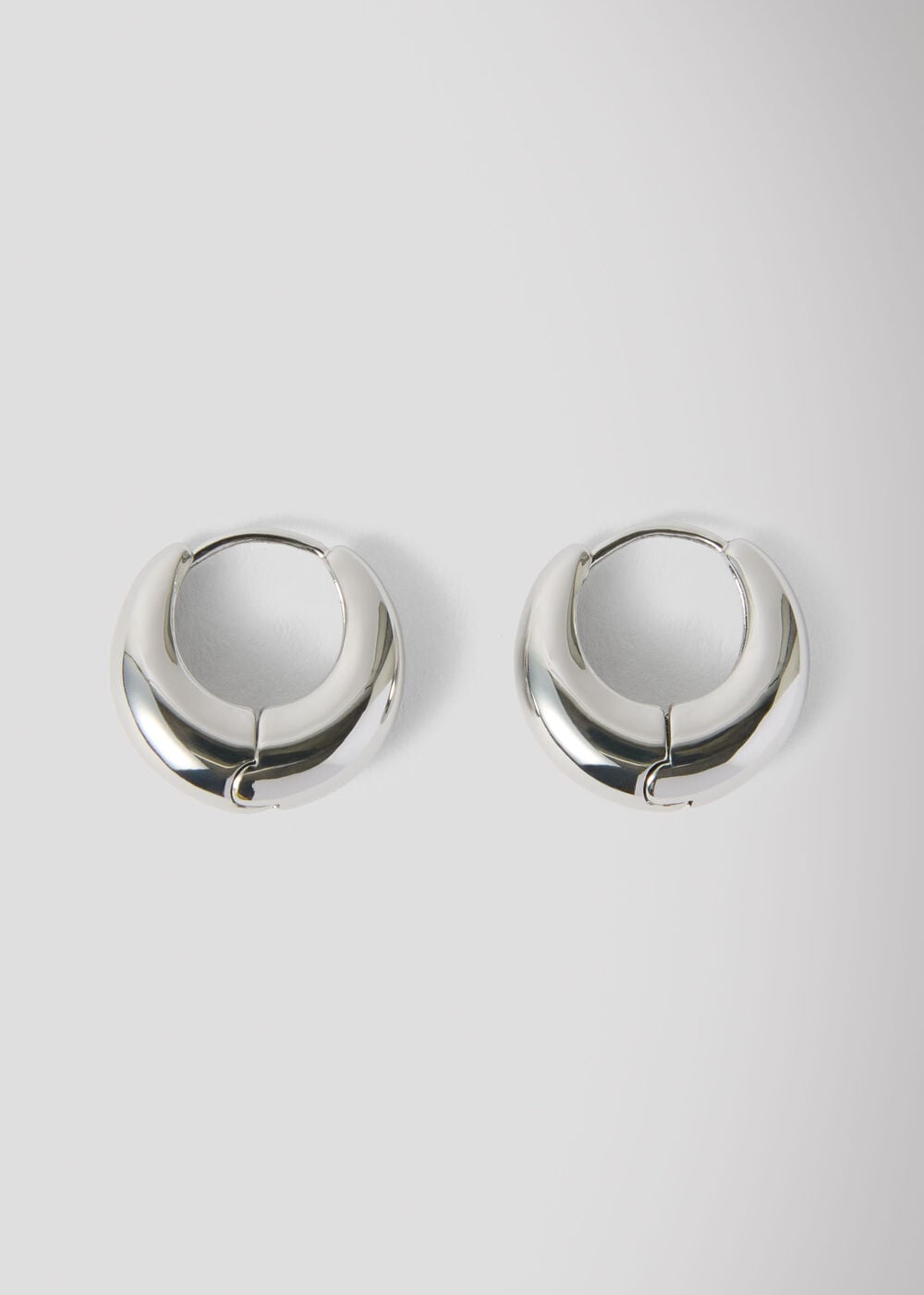 Silver Curved Huggie Hoop