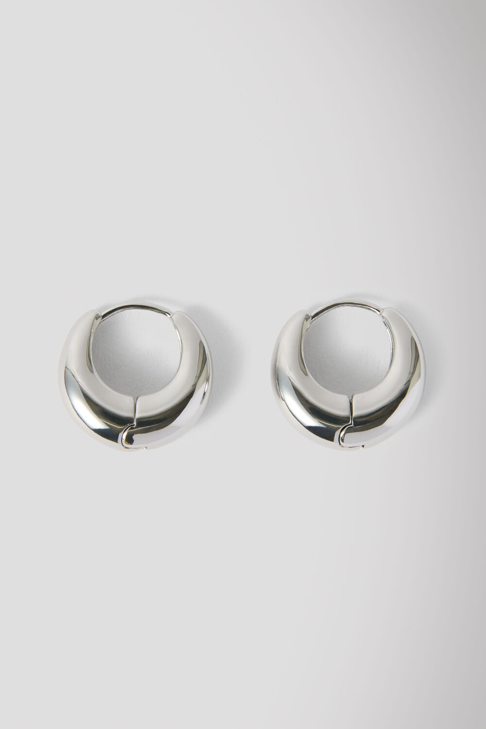 Silver Curved Huggie Hoop