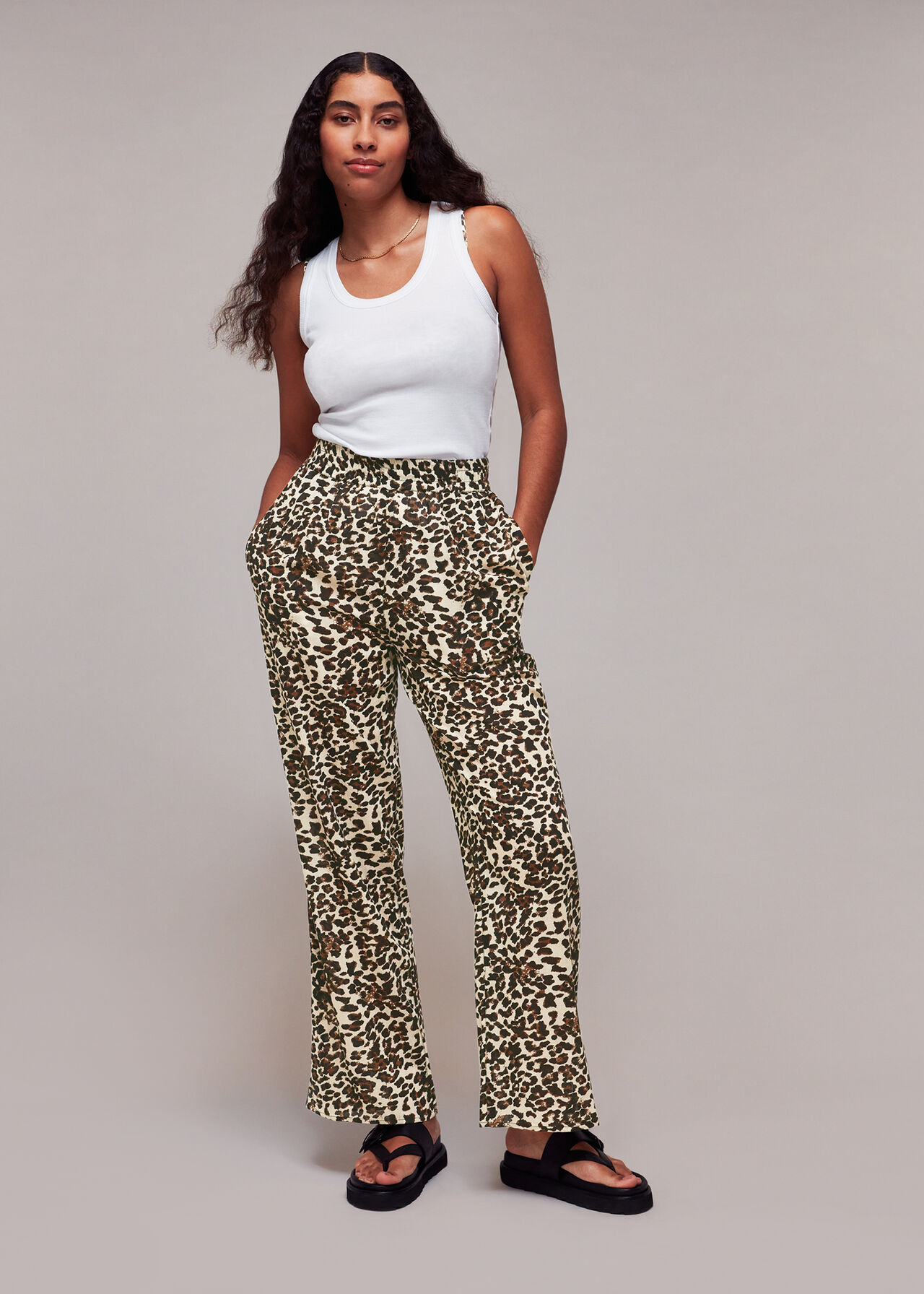 Whistles leopard print trousers fashioned entirely from cotton and with a loose flared silhouette. The animal print will look chic when paired with the matching shirt.