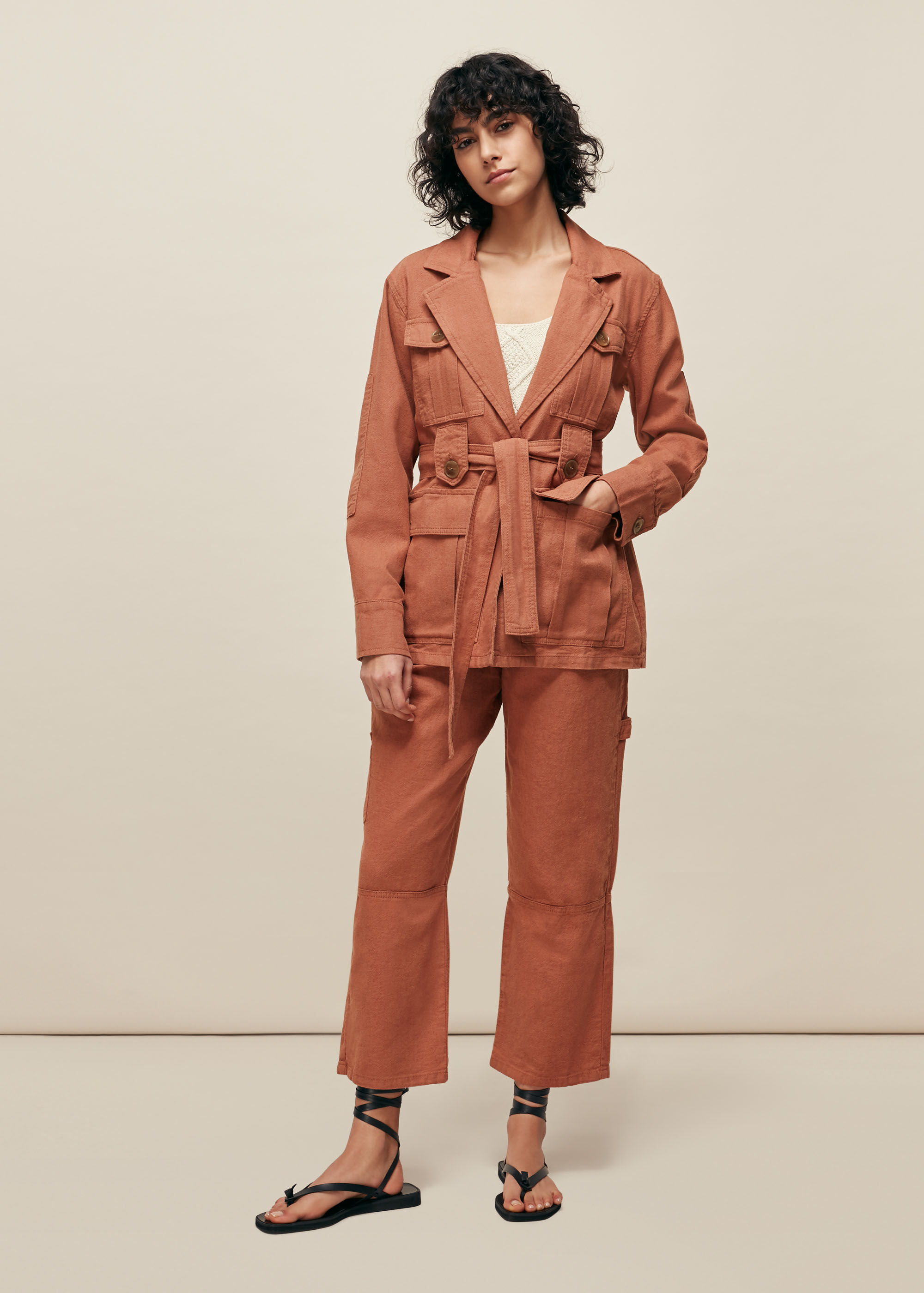 pink belted jacket
