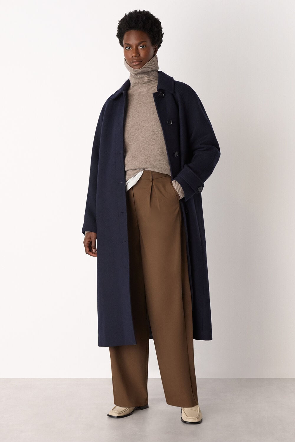 Wool Roll Curved Hem Knit