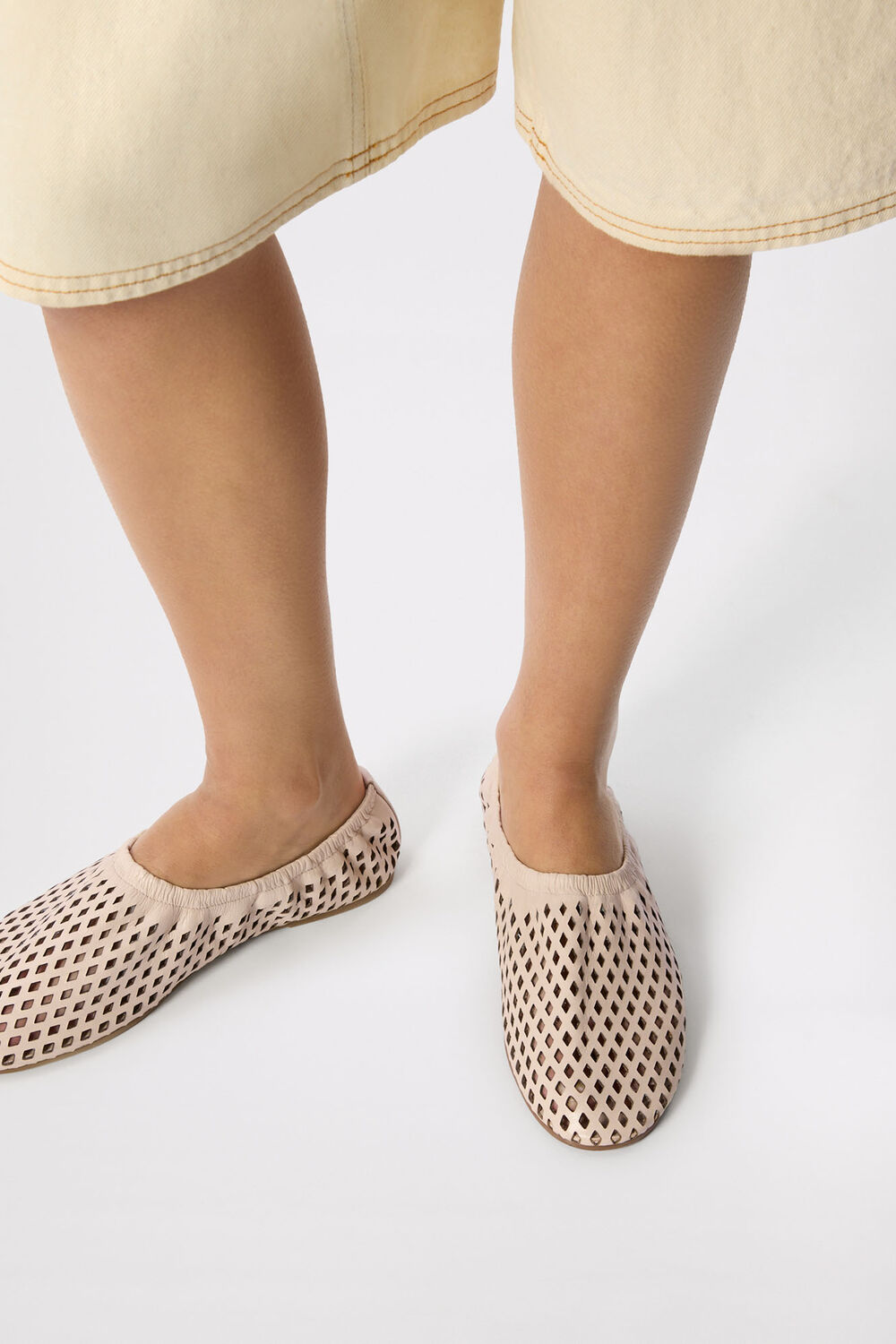 Ivory Lasercut Ballet Pump