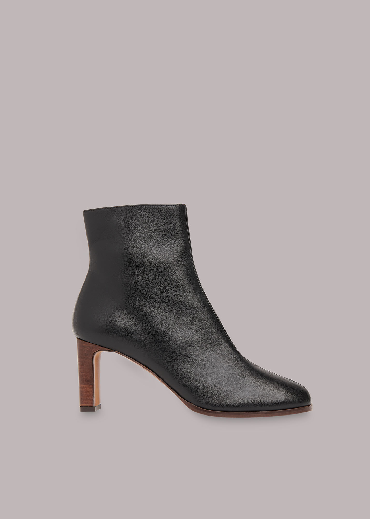 heeled leather black boots