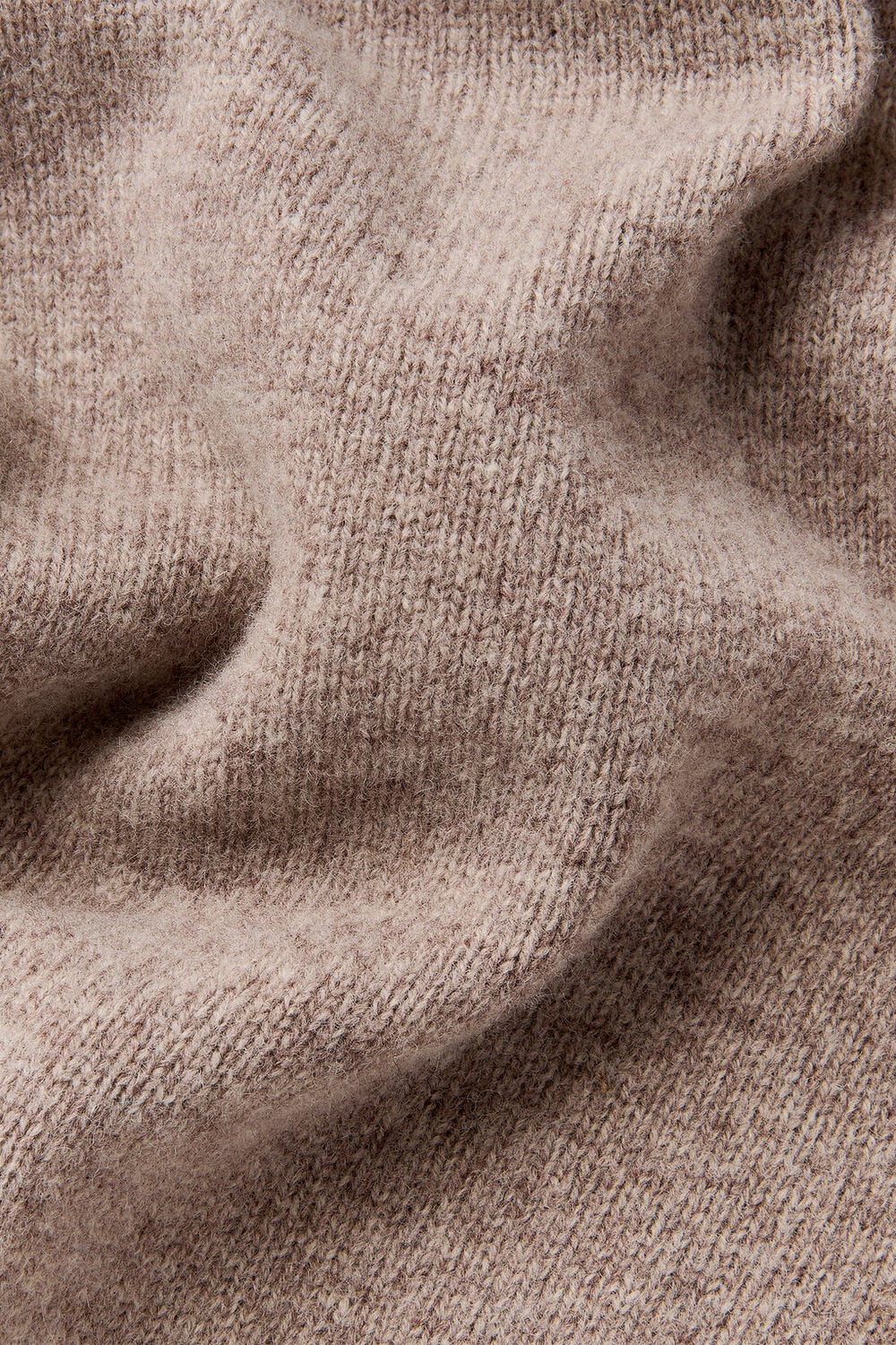 Wool Roll Curved Hem Knit