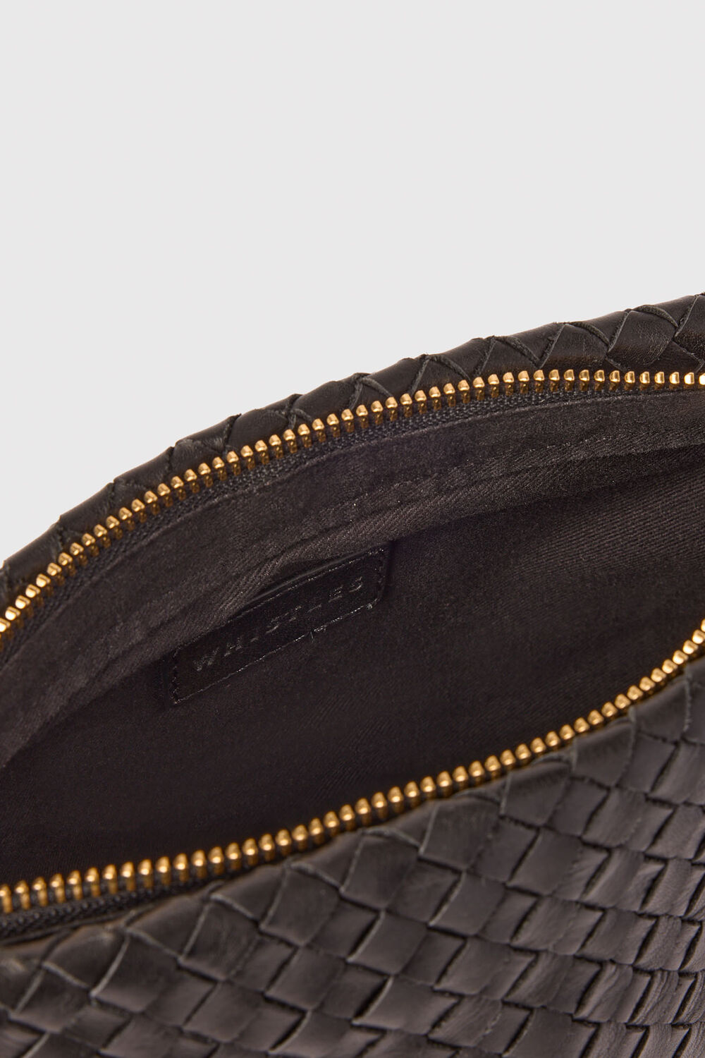 Avah Woven Zip Clutch
