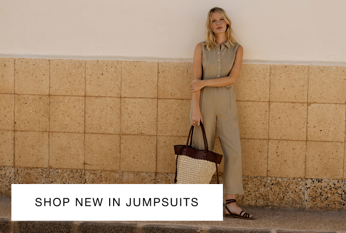 woman wearing whistles khaki jumpsuit