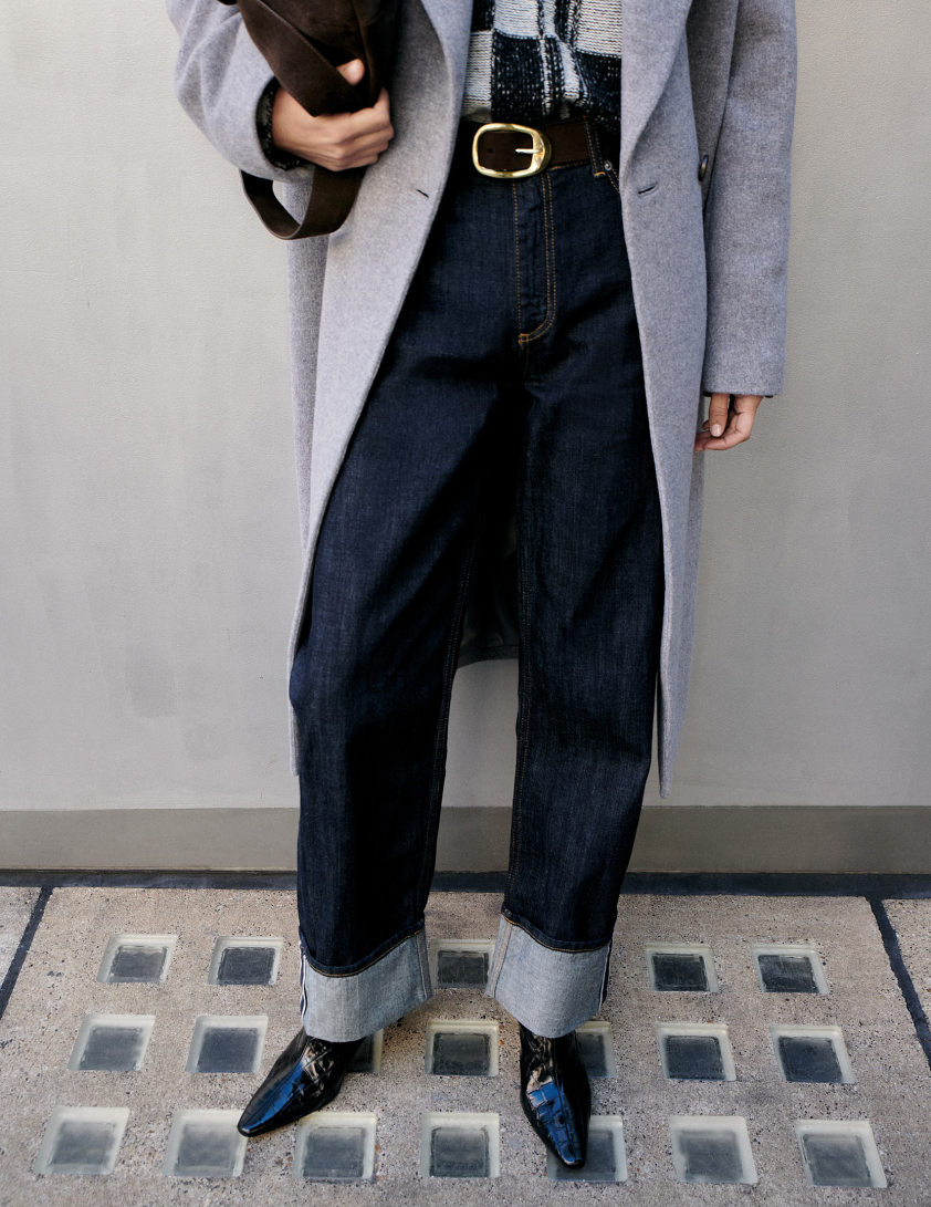 Woman wearing indigo turn up jeans