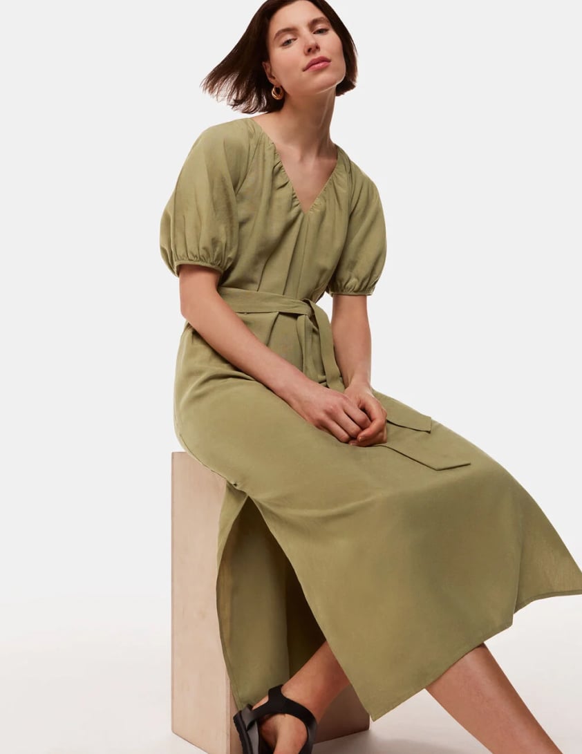 woman wearing green midi dress