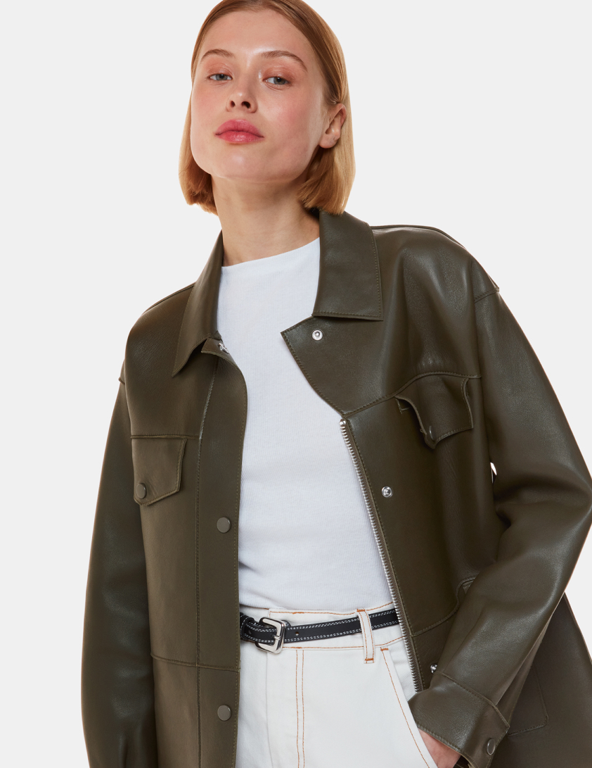 Woman wearing olive leather jacket