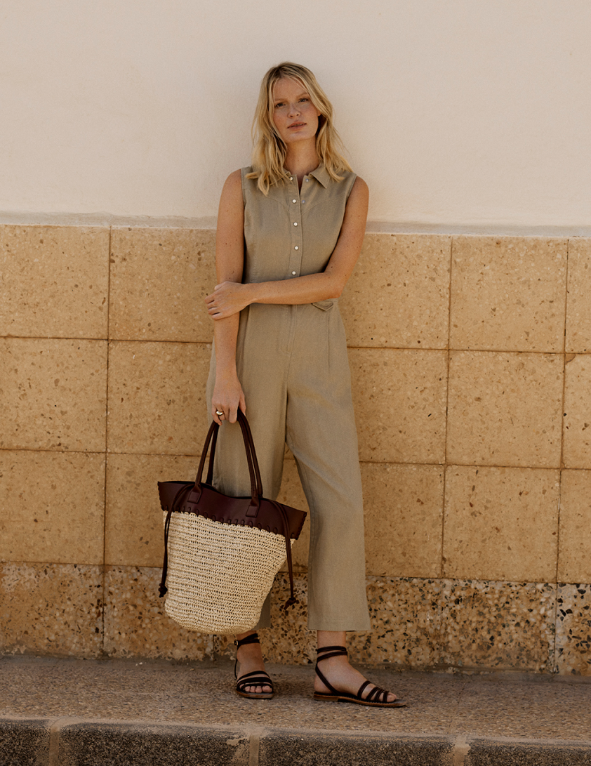 woman wearing netural linen jumpsuit