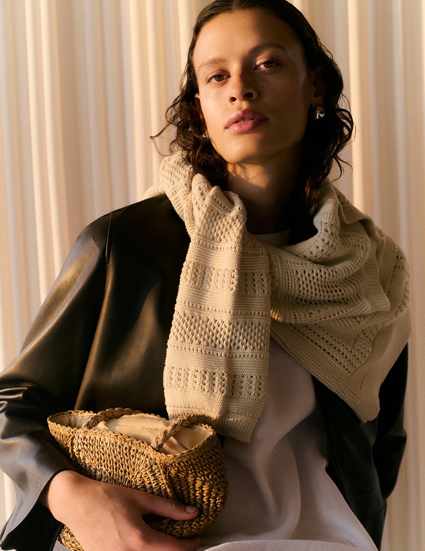 woman wearing funnel neck jumpers